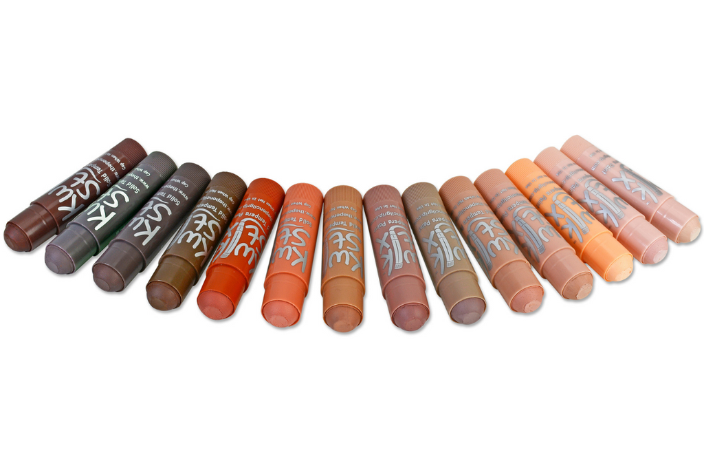 14 global skin tone paint sticks in a row