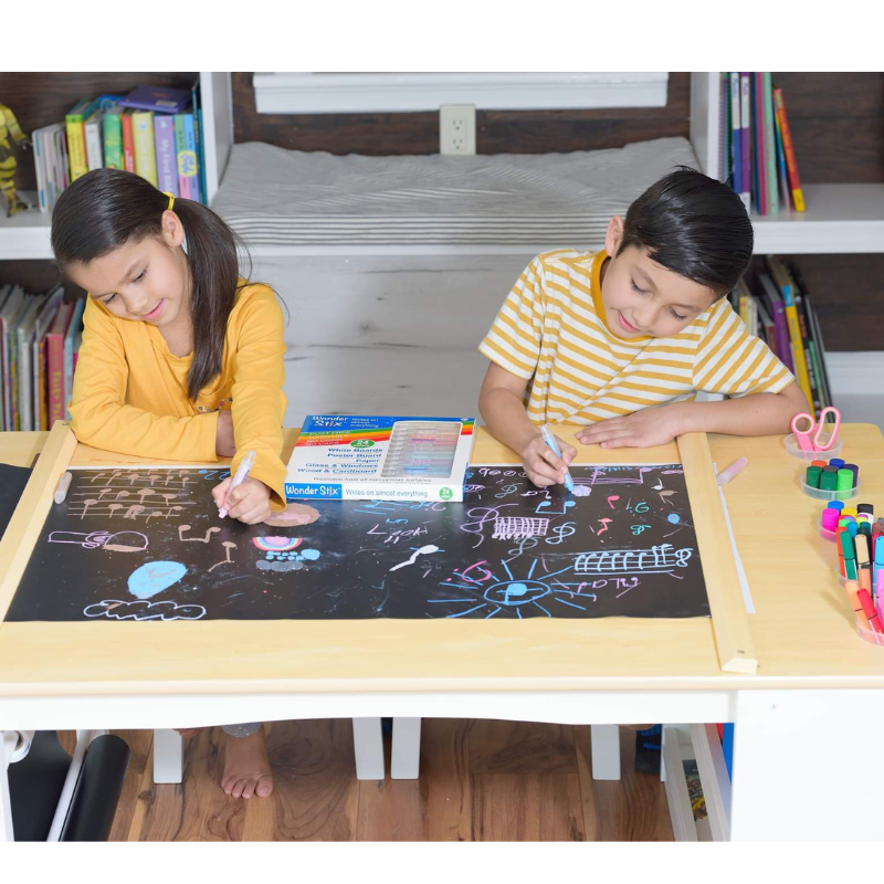 children coloring on wonderstix playmat